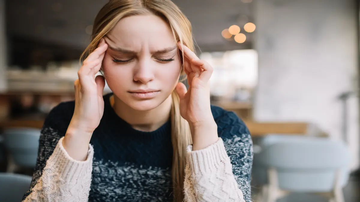 Headache. Young caucasian woman feel bad. Stressed. Depression. Female need medical pills, migraine